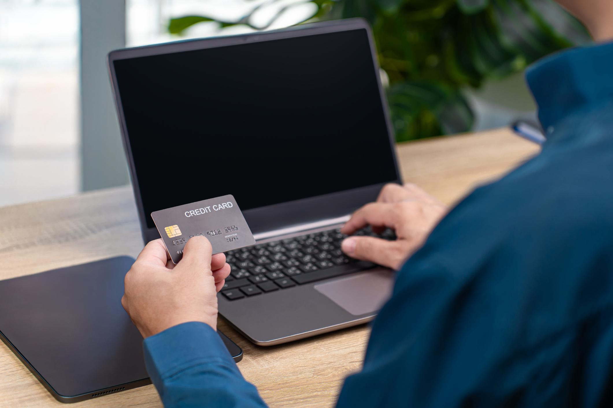 Business professionals analyzing digital payment processing and financial data