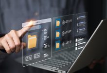 Business team managing organized digital files in a modern workspace